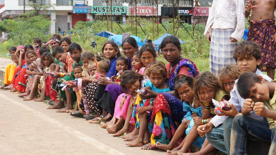 Long Line Of Children From Indian Slum