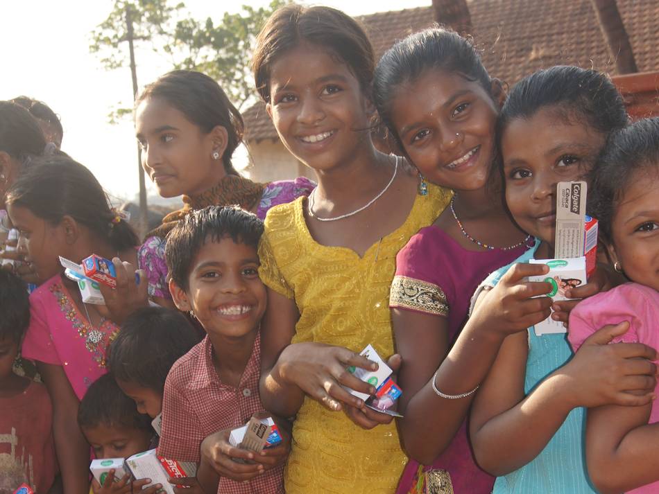 Children Smiling After Receiving Donations