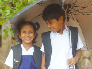 Govt School Uniforms are basic blue and white, this was taken last year when we gave out the uniforms.
