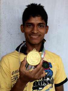 Showing Off the Kung Fu Medal he won