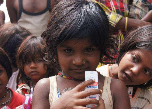 Intense Look From Child with curious girl behind