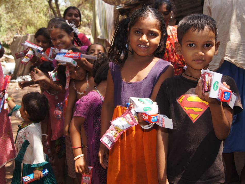 Children Lining Up For Health Packs