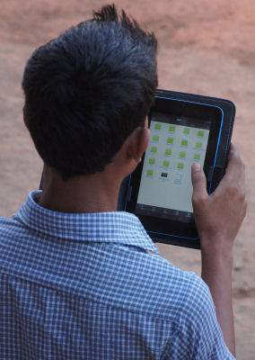 Child using his new Tablet provided through the Goa Cyber Scheme