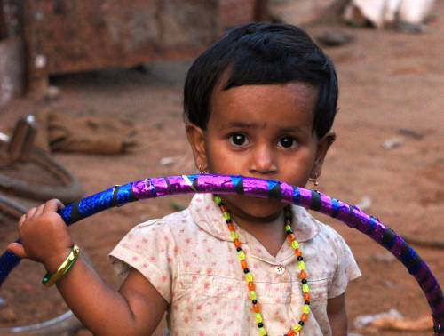 Young Girl with a freshly made, large Hula Hoop