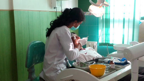 Children being looked after in the dentists chair