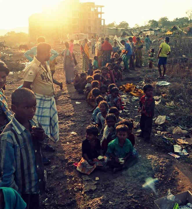 A mass of children waiting for the presents at one are in Mapusa2014/12-Fruit-Circles.jpg|Children split up into small groups so we could give things out more easily...