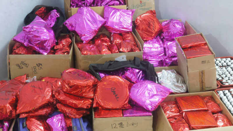 Boxes of wrapped Christmas presents for the children