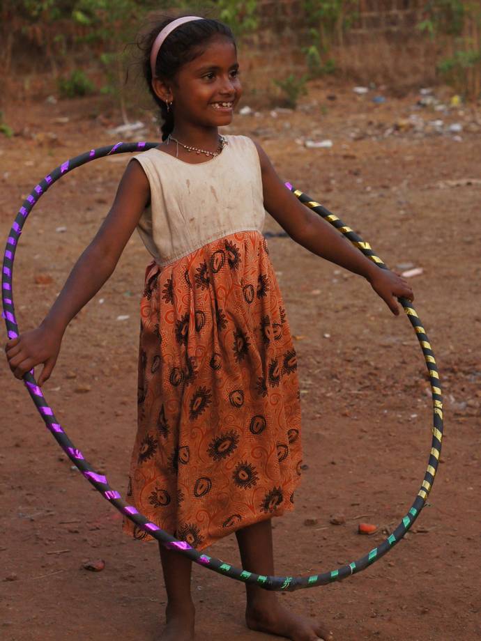 Standing Proud With Her Colourful Hula Hoop