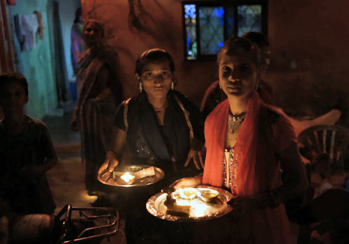 As I entered several of the young women were going for pooja to each others houses