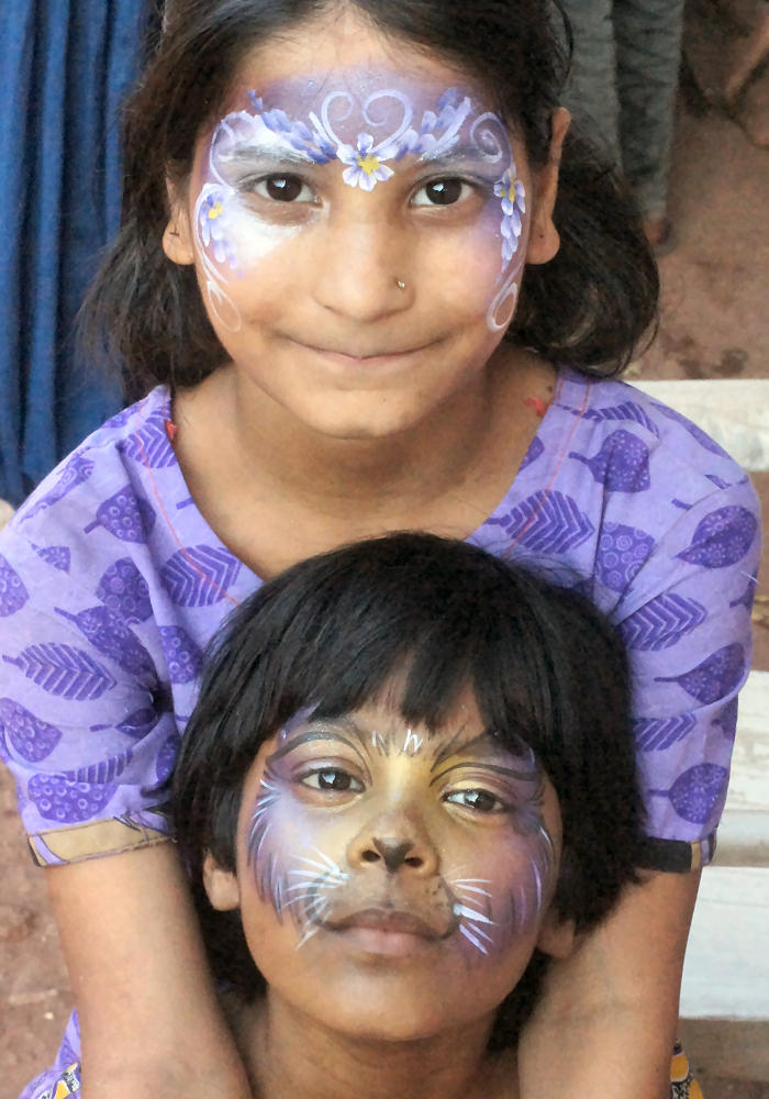 Sisters With Face Paints
