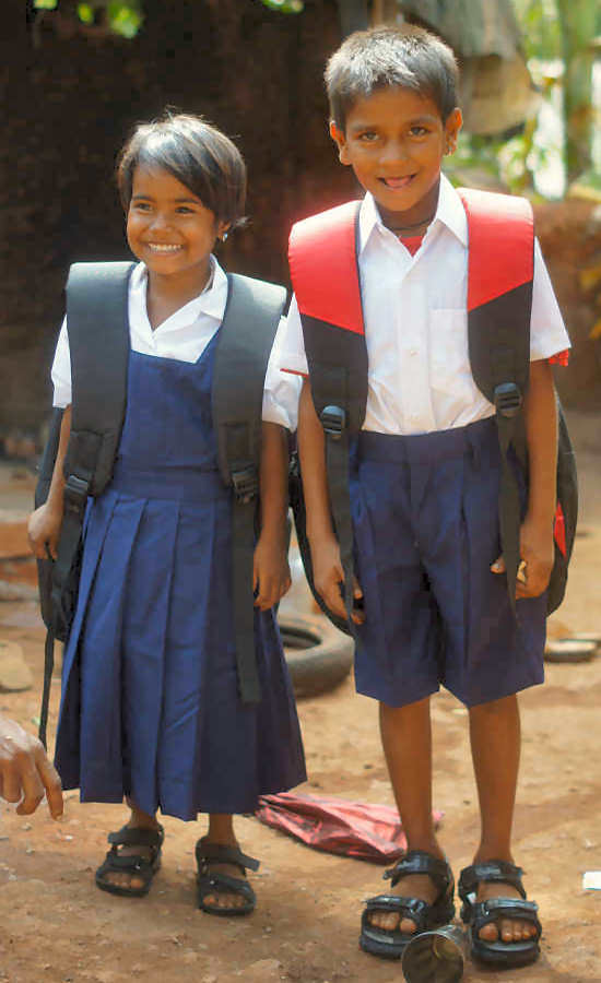 Two Young Children In Uniform