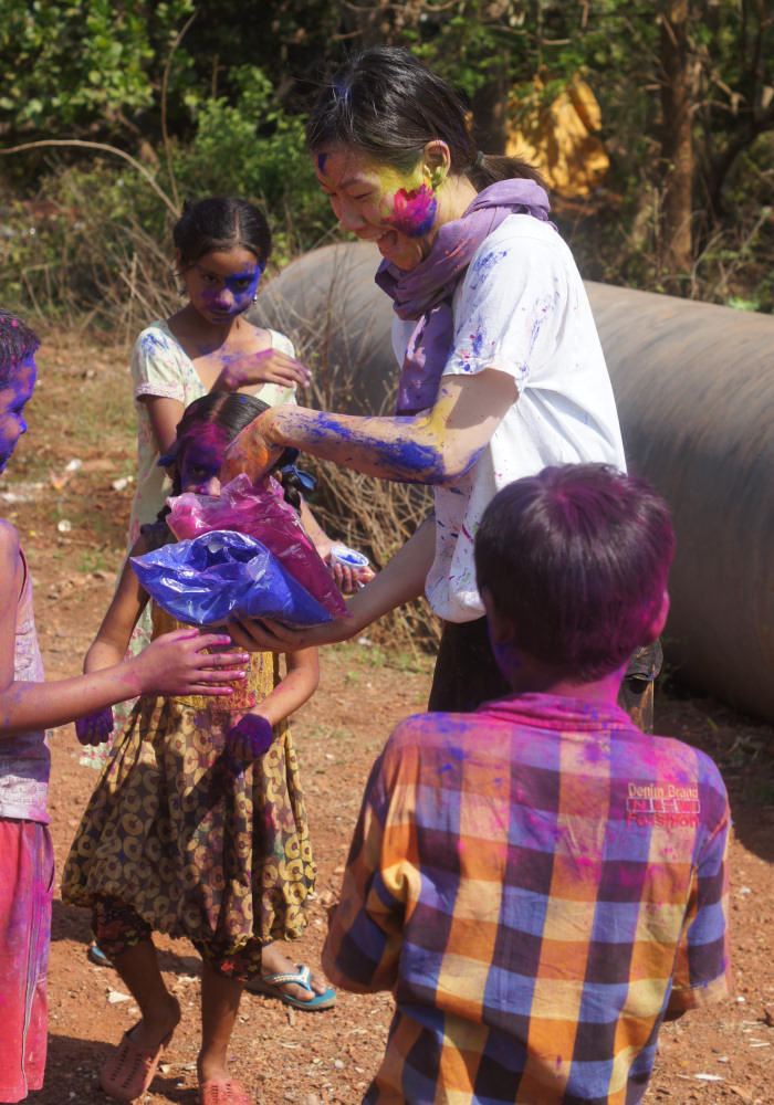 Giving Out Holi Colours For The Kids