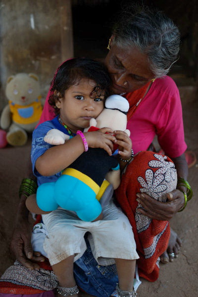 One of the children with their donated cuddly toy