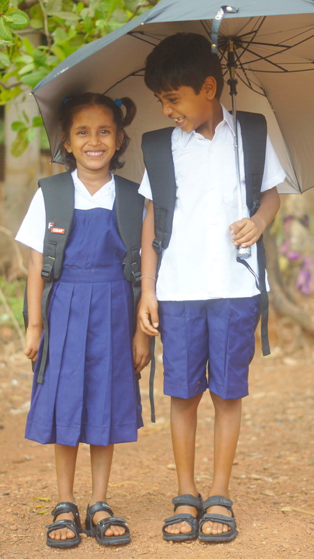 Govt School Uniforms are basic blue and white, this was taken last year when we gave out the uniforms.