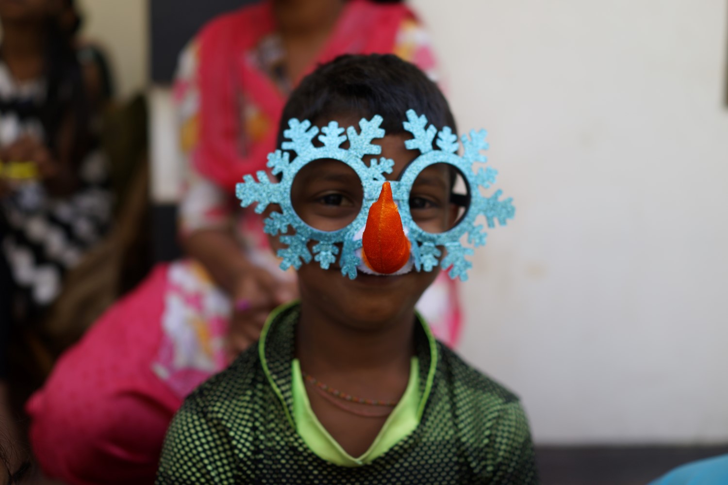 Boy Wearing Christmas Mask