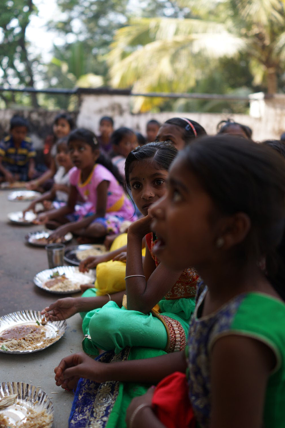 Children Enjoying Chicken Fried Rice And Chicken Curry
