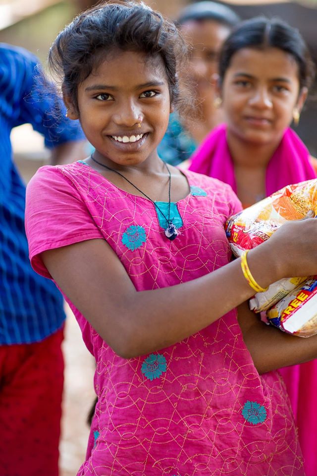 Holding The Flour That Sonali Donated