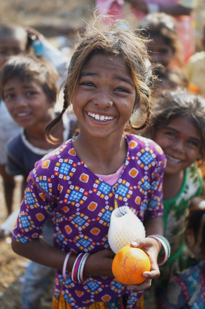 Smiling Girl With Fruit