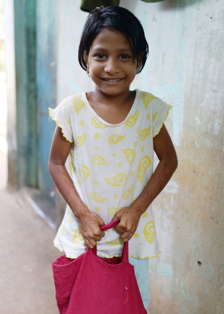 Cute Young Girl Holding Onto Her Diwali Bag