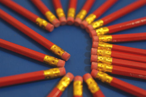 A small harmless eraser on the end of a pencil - Not meant for inside an ear!