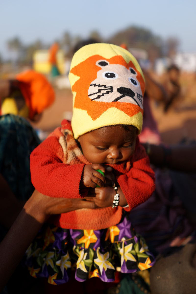 Baby With Yellow Lion Hat