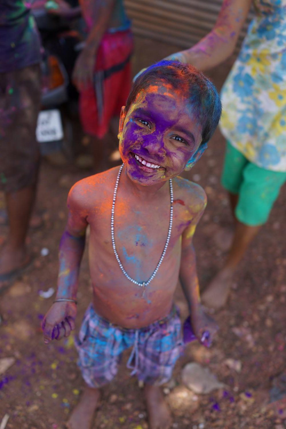 Smiling Boy Playing Holi
