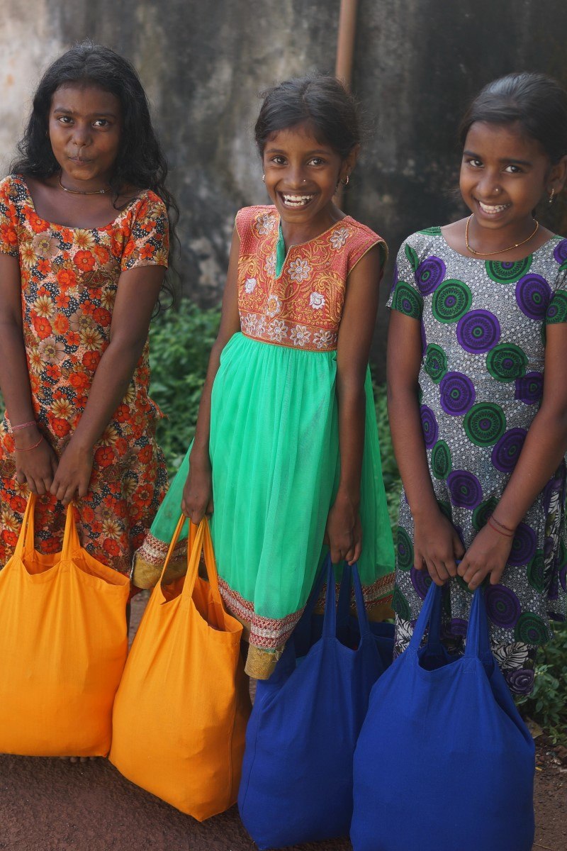 Three Girls With Their Bags