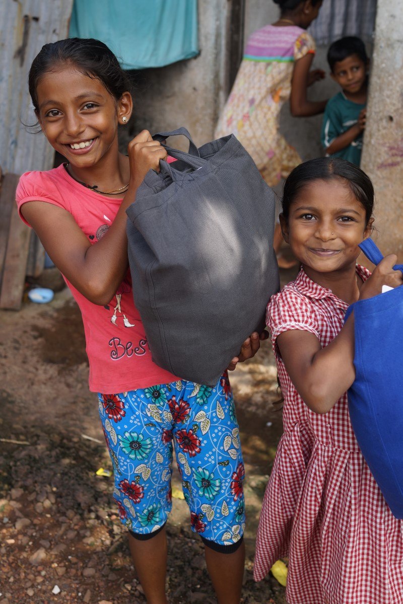 Two Girls With Diwali Donations