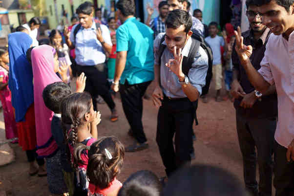 Students in association with childline came to entertain the children in the slums