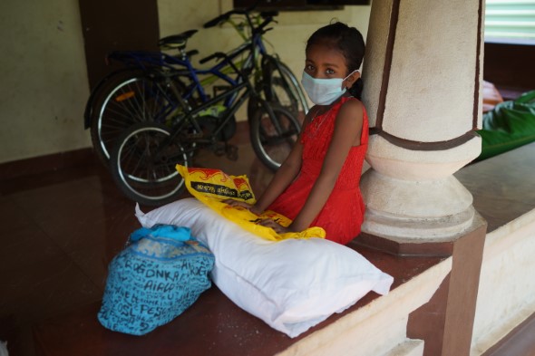 Girl collecting supplies