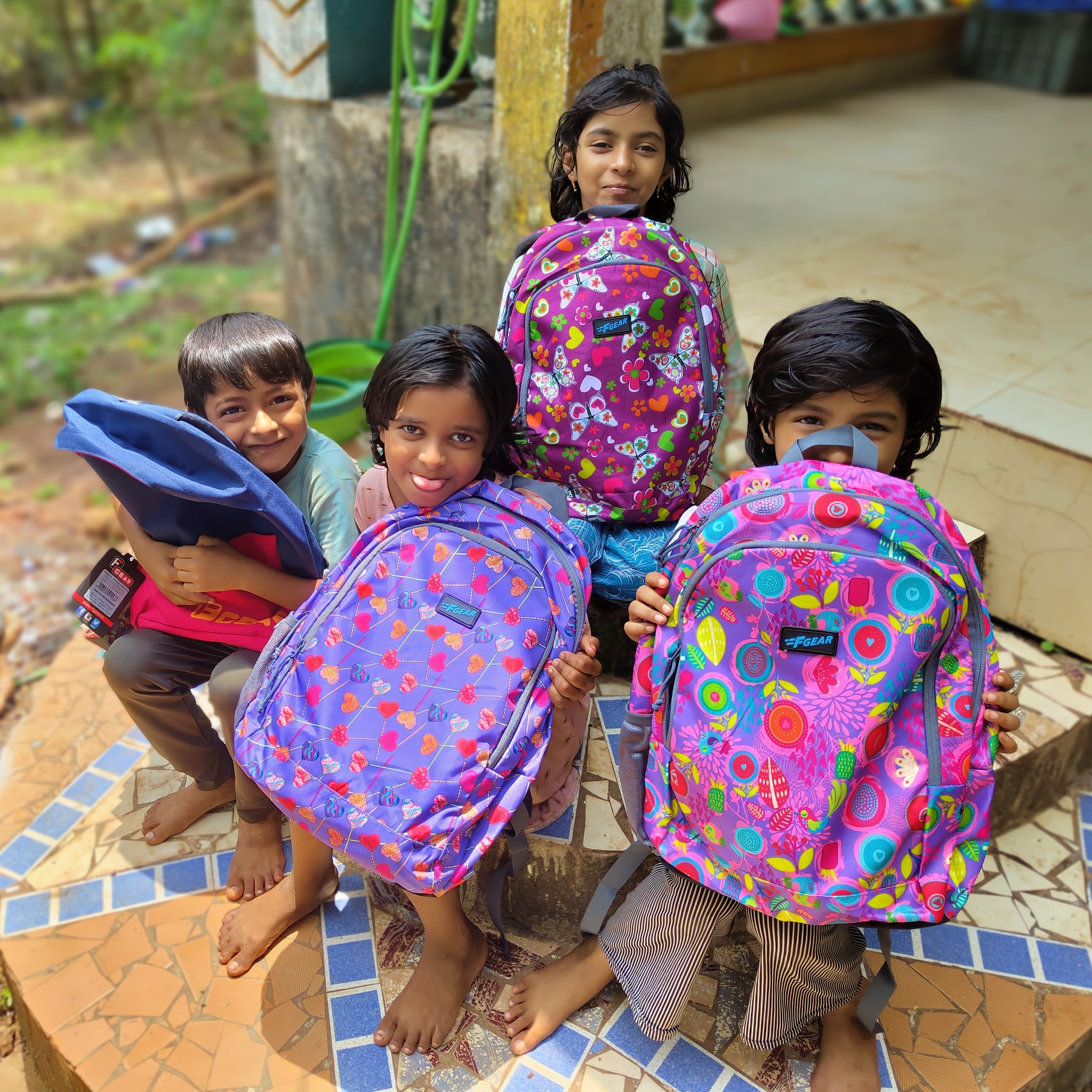 A Few of the children receiving their new school bags
