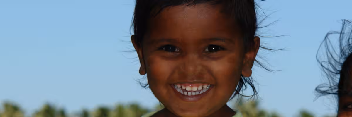 Smling Face Of A Child Of Road Workers.
