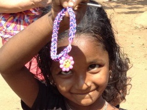 Girl with her beautifully crafted Friendship bracelet
