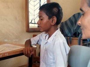 Sahil speaking to the teacher during the admission process.
