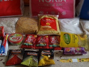 What makes up a Diwali present for the famiies of the children we help? Ans : Rice, Flour, Sugar, Beaten Rice, Tur dal, Cooking Oil, Chilli Powder, Coriander Powder, Turmeric Powder, Tea, Large Family Toothpaste, Toothbrushes and small Toothpaste packs, Mosquito Plug and refill, Biscuits, Face Soap, Utensil soap and Scrubber