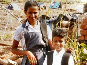 2015/June/Children-In-Uniform-Near-Slum.
