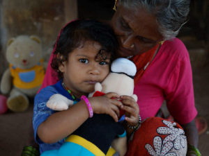 One of the children with their donated cuddly toy
