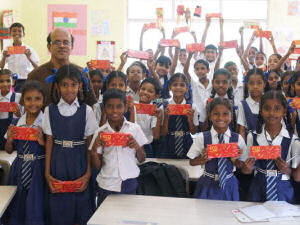 Giving out Geometry Boxes at local goverment school