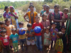 A ouple of footballs being given out to road working children