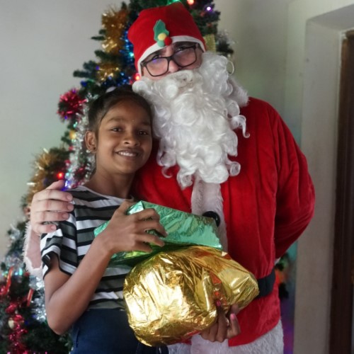Gir Holding Presents given by Father Christmas