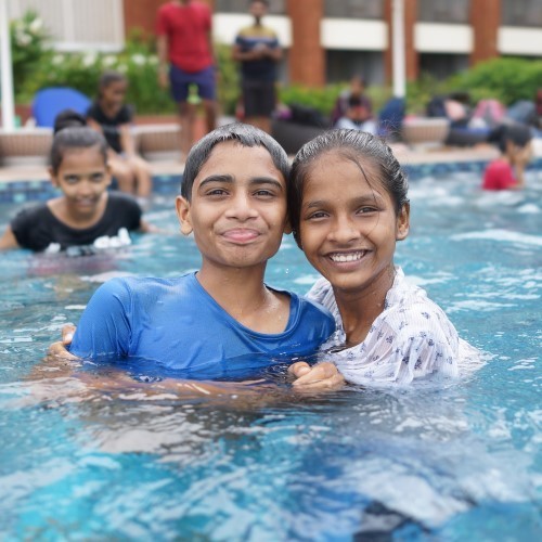Kids Enjoying Swimming in a pool