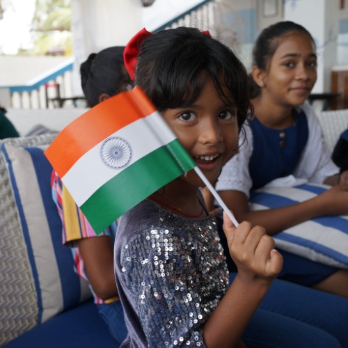Indian Girl Flying Indian Flag on Independance Day